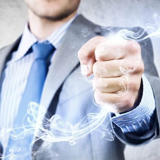 Close up image of businessman clenching fume in fist